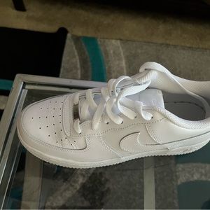 All white Nike shoes